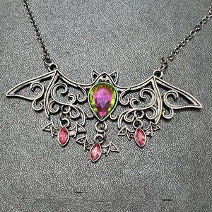 **Sale** Silver tone dangling bats necklace